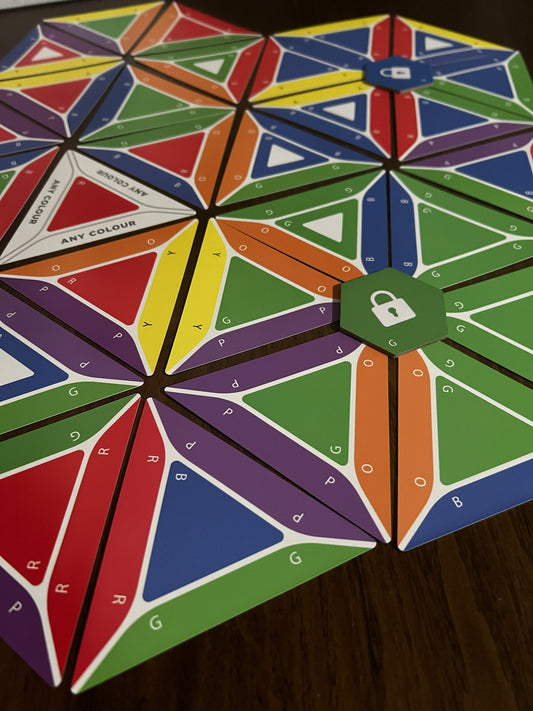 Trigahex updated box and cards showing ne cards, new mold, clearer instructions, and STEM accreditation logos.