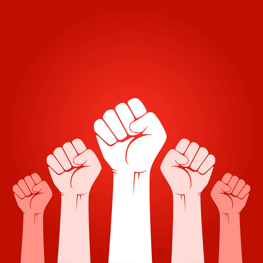 Raised hands symbolising a tabletop revolution, showing how simple games are leading a new wave of competitive play