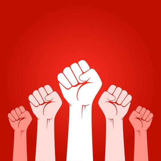Raised hands symbolising a tabletop revolution, showing how simple games are leading a new wave of competitive play