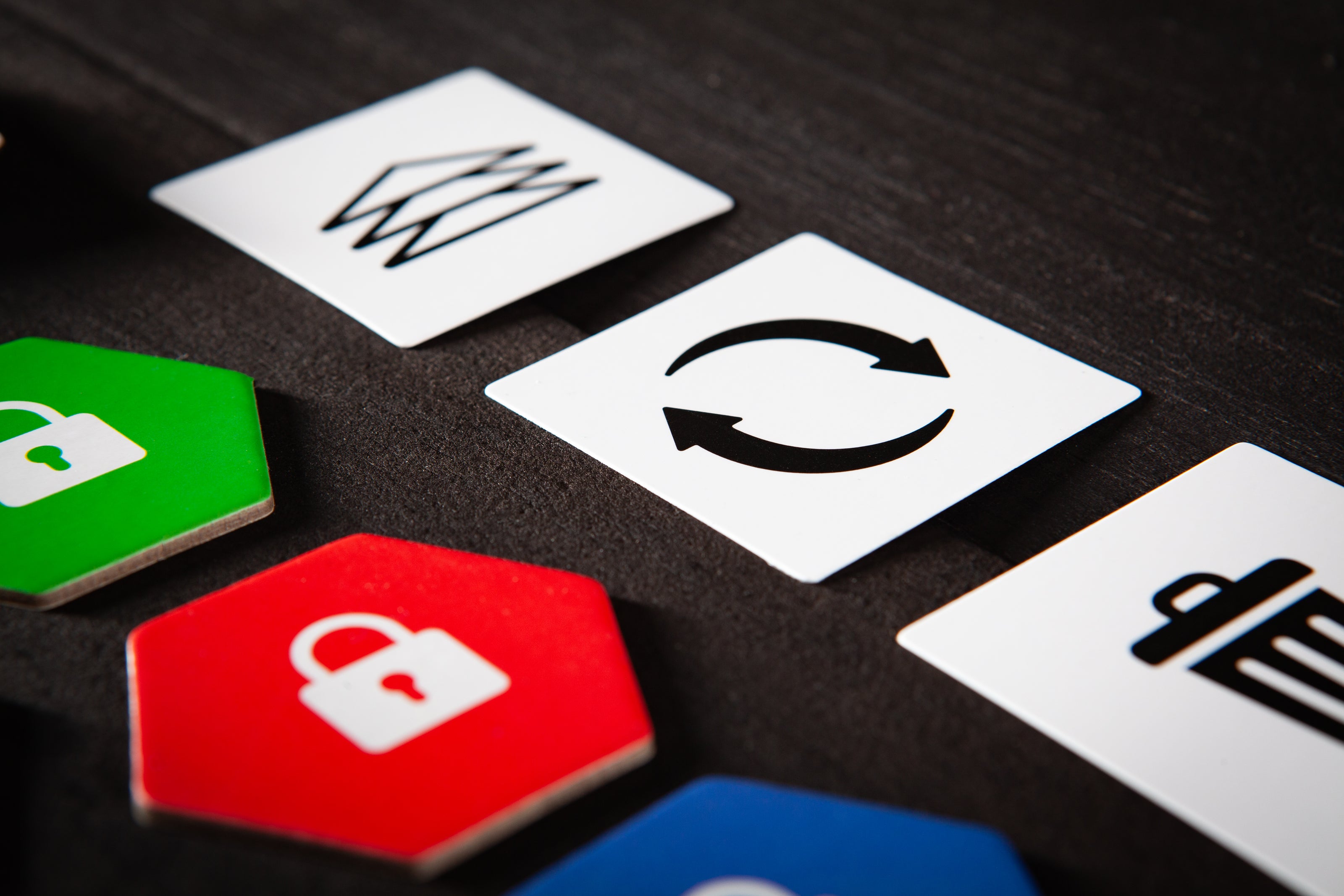 Close-up of Trigahex action cards used to shift gameplay in this strategic, family-friendly card game
