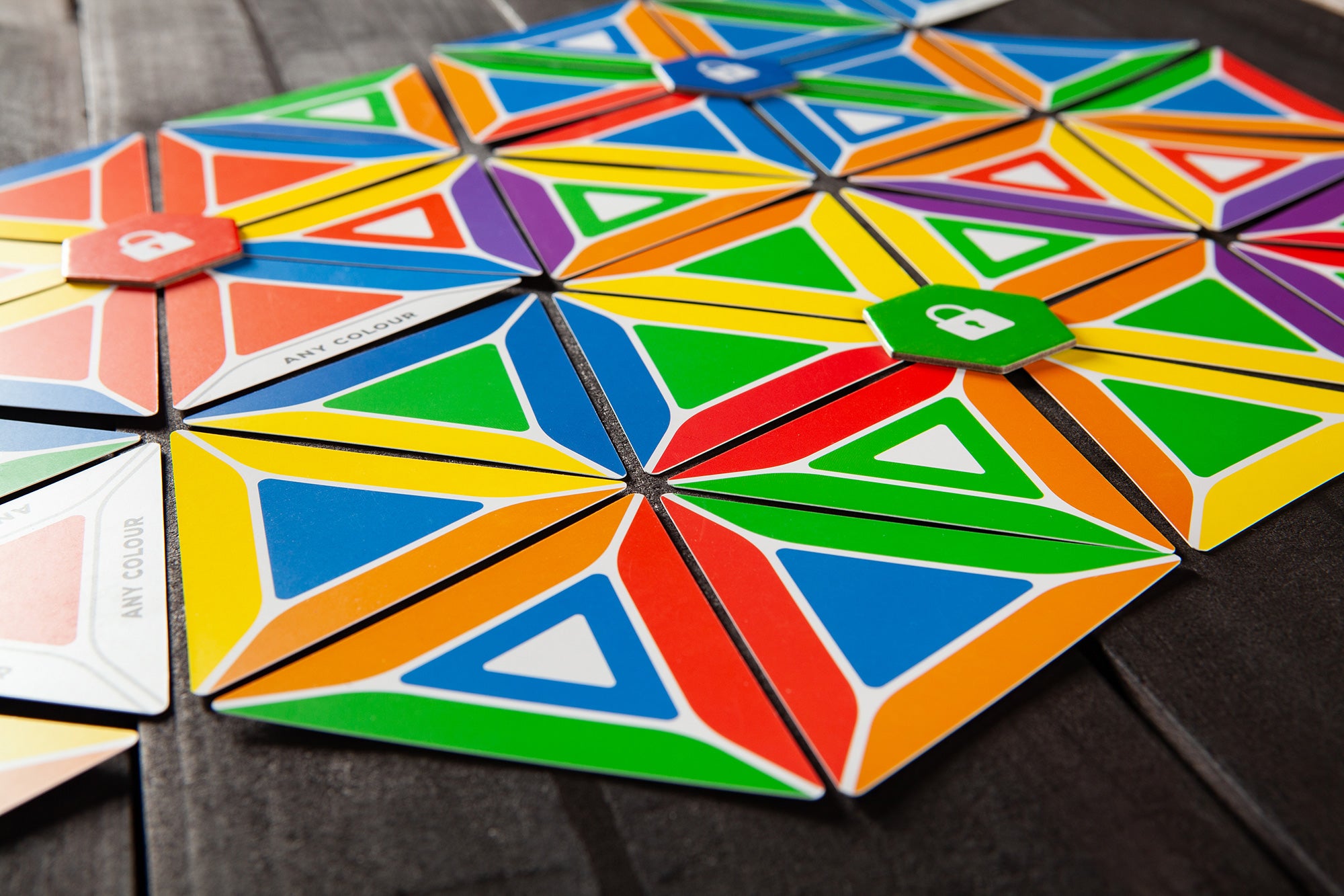 A detailed look at the Trigahex cards, featuring vibrant colours and unique hexagon shapes that highlight the game’s simple yet strategic design for all ages.